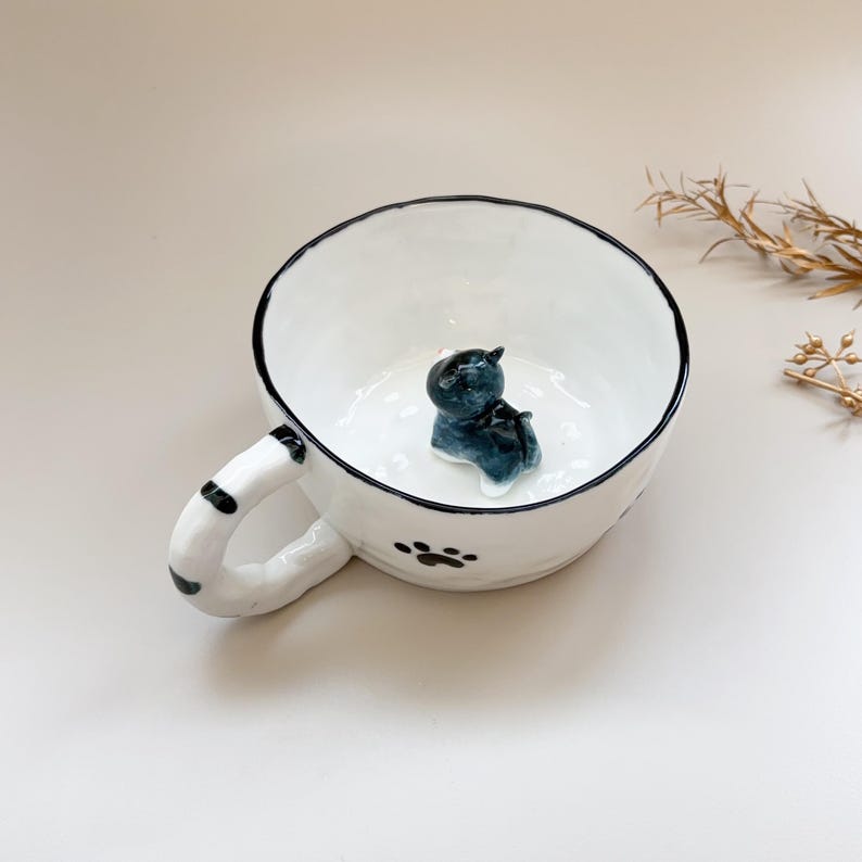 Footprints-hidden animal coffee mug