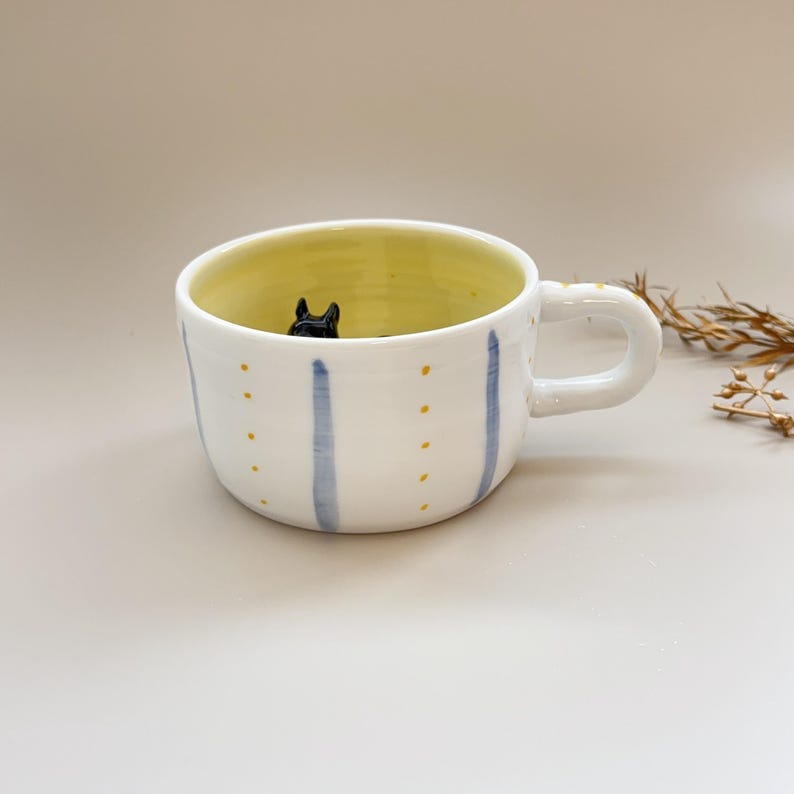 Clocy-hidden animal coffee cup